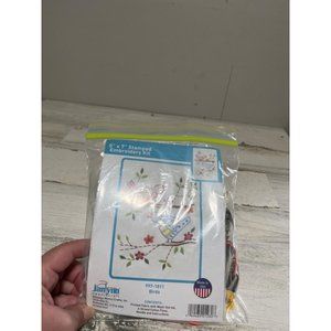 Stamped embroidery kits.